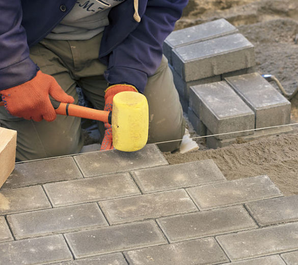 Kinnucan - we offer fall clean up services - repairing walkways before winter.