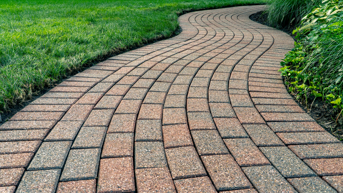 brick pavers used as decorative hardscaping in a backyard